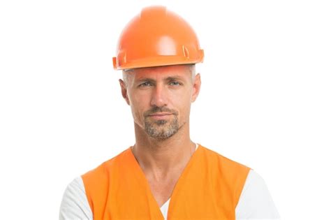 Premium Photo Man In Helmet Wear Construction Helmet On Building Site Builders Dressed In