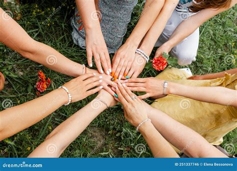 Female Models Joining Hands In A Circle Teamwork Stock Photo Image