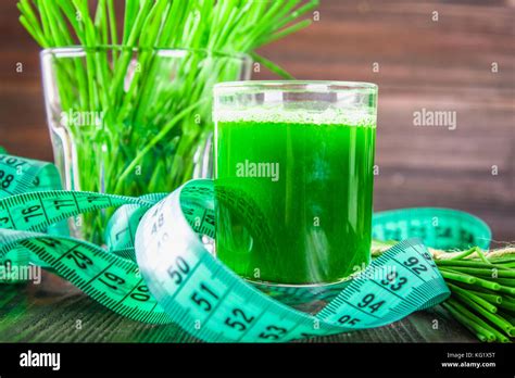 Wheatgrass Shot Juice From Wheat Grass Trend Of Health Stock Photo