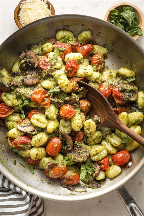 Gnocchi With Pesto And Charred Cherry Tomatoes Nourish And Fete