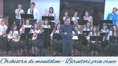 După cum Cel ce va chemat Orchestra de mandoline Biruitori prin cruce