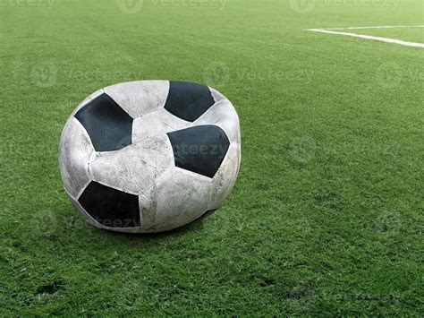 Old Deflated Soccer Ball On Soccer Field Stock Photo At Vecteezy