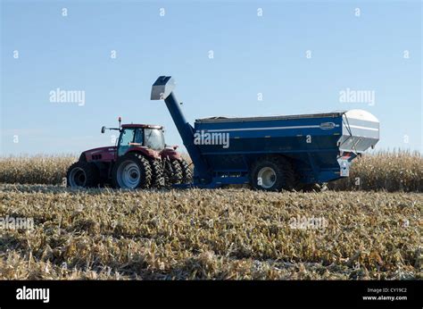 Tractor Harvesting American Field Stock Photo - Alamy