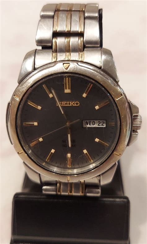 Seiko Sne098 Solar Quartz Stainless And Gold Tone Grey Dial V158 0ad0 Ebay