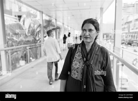 Portrait Of Mature Beautiful Indian Woman Exploring The City Stock