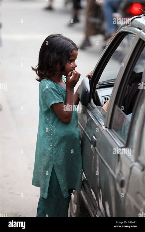 Homeless Girl Begging In The Street Of Kathmandu Nepal Stock Photo Alamy