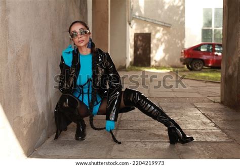 Portrait Brunette Wearing Leather Coat Blue Stock Photo