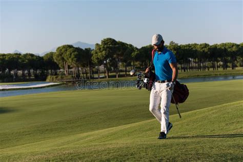 Golf Player Walking And Carrying Bag Stock Image Image Of Person