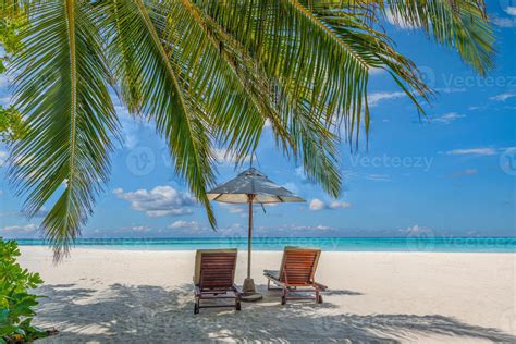 Beautiful Tropical Island Two Chairs Umbrella Under Palm Tree Leaves