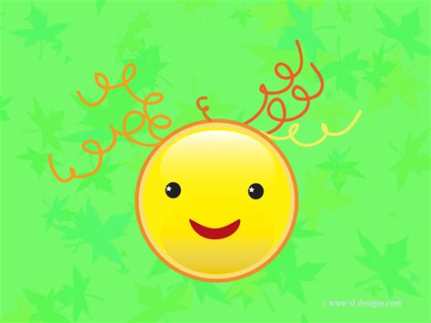 Smiley face on green desktop wallpaper