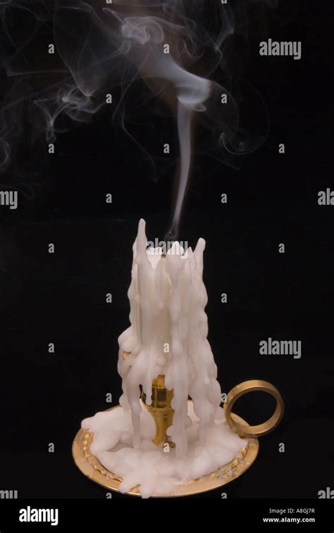 Candle Flame Being Extinguished Smoke Rising Stock Photo Alamy