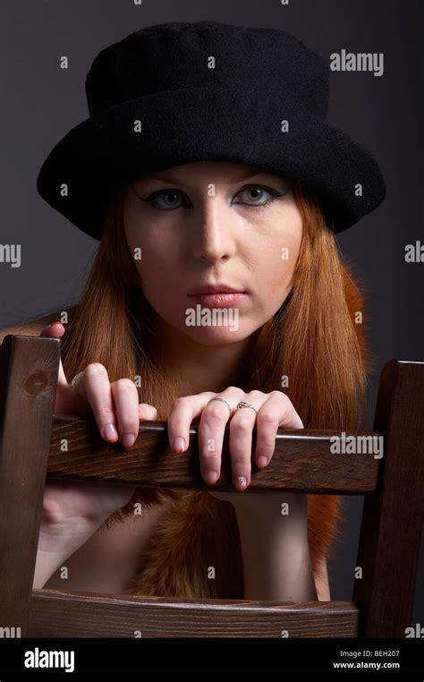 Portrait Of Beautiful Redhead Pale Skinned Model In Fur Fox Scarf And