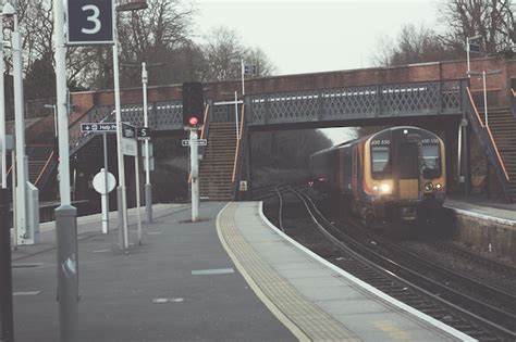 Premium Photo Railroad Track Passing Through City