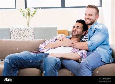 Gay Couple Relaxing On Couch Hi Res Stock Photography And Images Alamy
