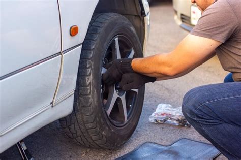 Premium Photo Car Mechanic Fixing Car