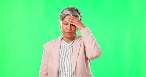 Anxiety Headache Or Mature Businesswoman On Green Screen With Burnout