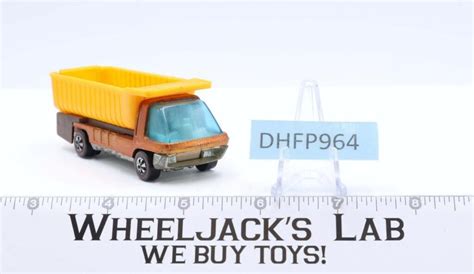 The Heavyweights Dump Truck Orange Hot Wheels Mattel Vintage Redline RL Wheeljack S Lab