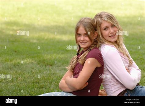 Portrait of young girls on grass, Regina, Saskatchewan Stock Photo - Alamy