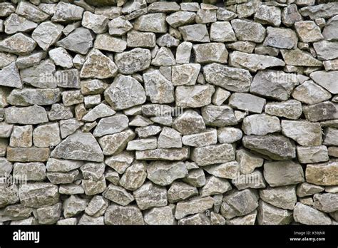 Dry stone wall texture background Stock Photo - Alamy