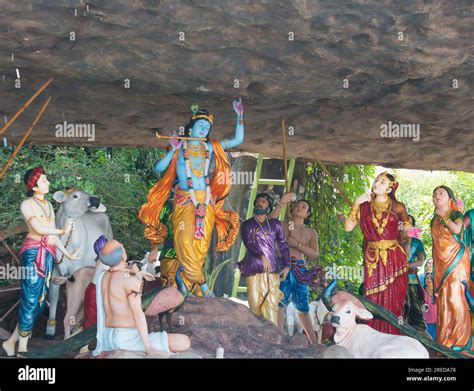 Colorful life size idols of Krishna with Govardhan Parvat or hill at ...