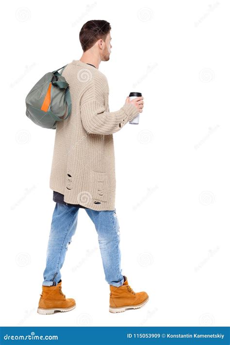 Back View Of Walking Man With Coffee Cup And Green Bag Stock Image