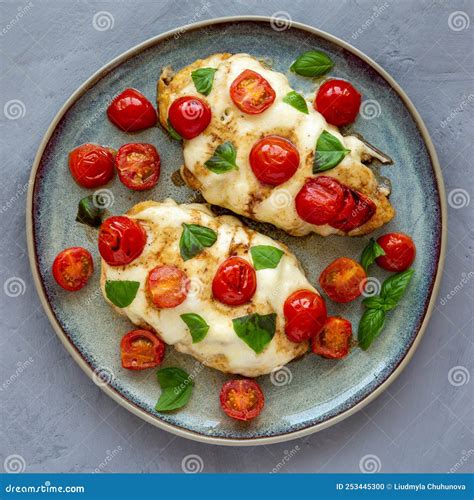 Homemade Caprese Chicken Parmesan With Tomato Mozzarella And Basil On