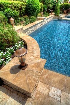 I Like The Travertine Coping And Wall With Raised Tiling For