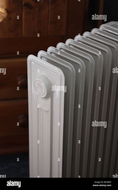 A portable radiator in the home which is electric Stock Photo - Alamy