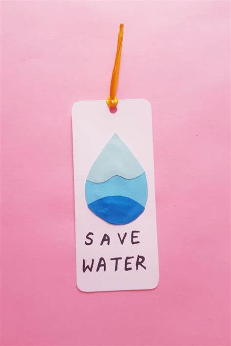 A Tag With The Words Save Water Hanging From It S Side On A Pink Background