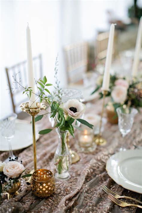 Mixed Bud Vases With White And Blush Poppies And Roses And Mixed Gold Tapered Candle Stick Holde