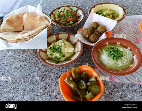 Traditional Jordanian breakfast- Hummus, Falafel and Pita bread served ...