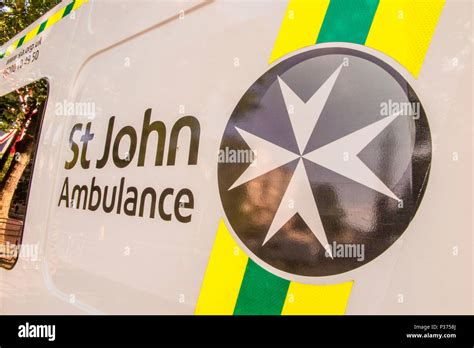 A St John's Ambulance logo on the side of an ambulance Stock Photo - Alamy