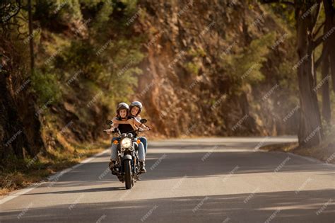 Free Photo Lesbian Couple On A Motorcycle Road Trip