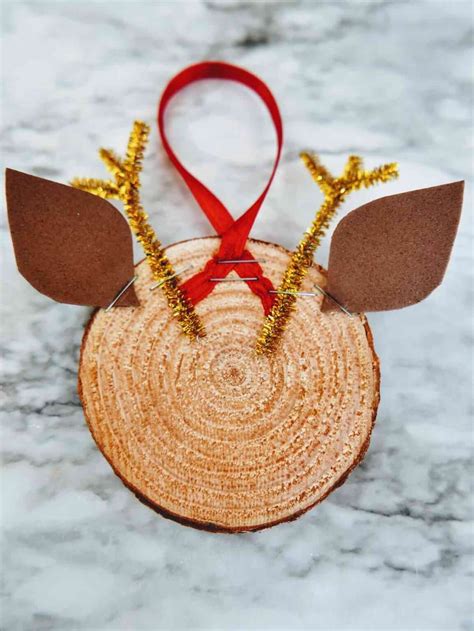 Diy Reindeer Ornaments With Wood Slices Marcie In Mommyland