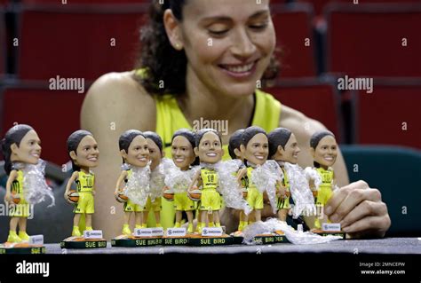 Seattle Storms Sue Bird Signs Bobblehead Likenesses Of Herself During