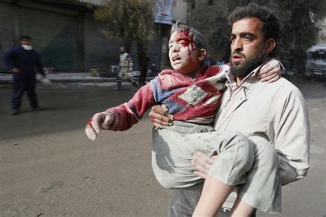 Syria Rejects Authenticity Of Graphic Photos Detailing Systematic