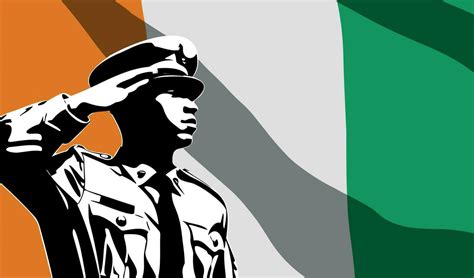 Silhouette of soldier with Ivory Coast flag on background. 28649725 ...