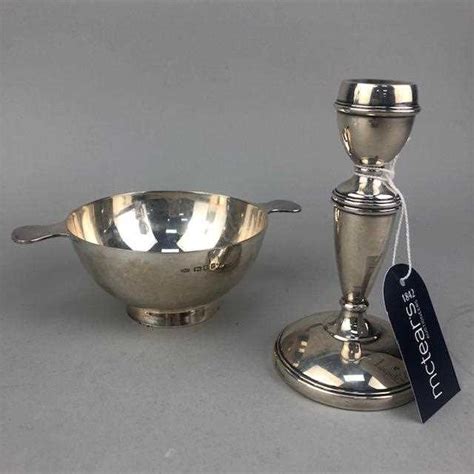 Lot 6 A Silver Quaich And A Silver Candlestick