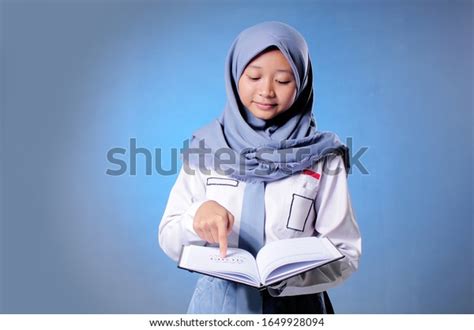Muslim High School Student Reading Book Stock Photo 1649928094