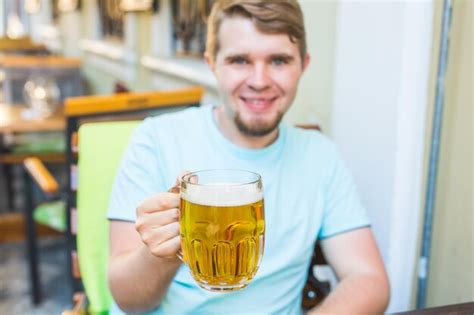 Premium Photo Portrait Of A Young Man Drinking Glass