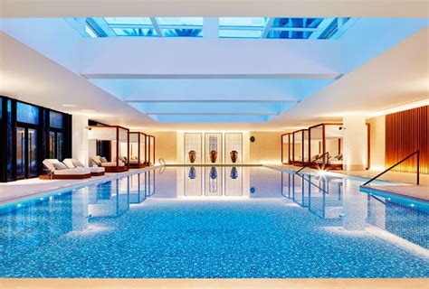 A Large Indoor Swimming Pool With Skylights