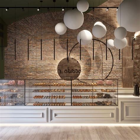 The Interior Of A Bakery With Lots Of Baked Goods On Display And Lights