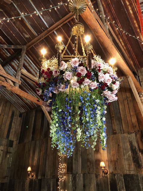 Rustic Barn Wedding; flower chandelier; hanging flowers; flowers ...