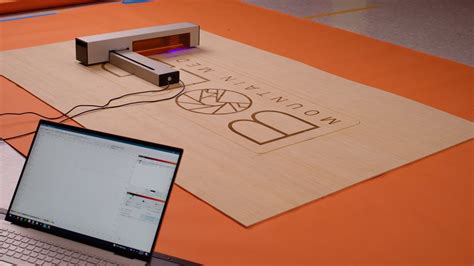 Make Projects Of Unlimited Size With The Optic Portable Laser Cutter