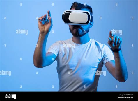 Model Young Man With Beard In Glasses Of Virtual Reality Augmented