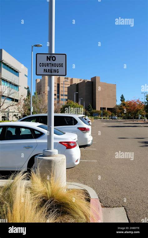 No Courthouse Parking sign on an bright early morning day in downtown ...