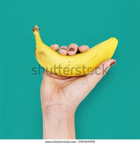 Human Hand Holding Banana Fruit Nutrition Stock Photo 549469498