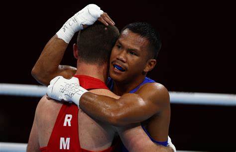 Eumir Marcial KOs way to sure Olympic boxing bronze