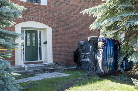 Photos Two People Extricated After Suv Crashes Into Kanata Home Ottawa Citizen