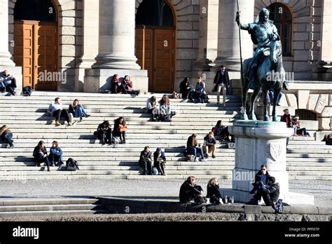 Sunbathing On The Stairs To The Former Army Museum On The Rear Side Of